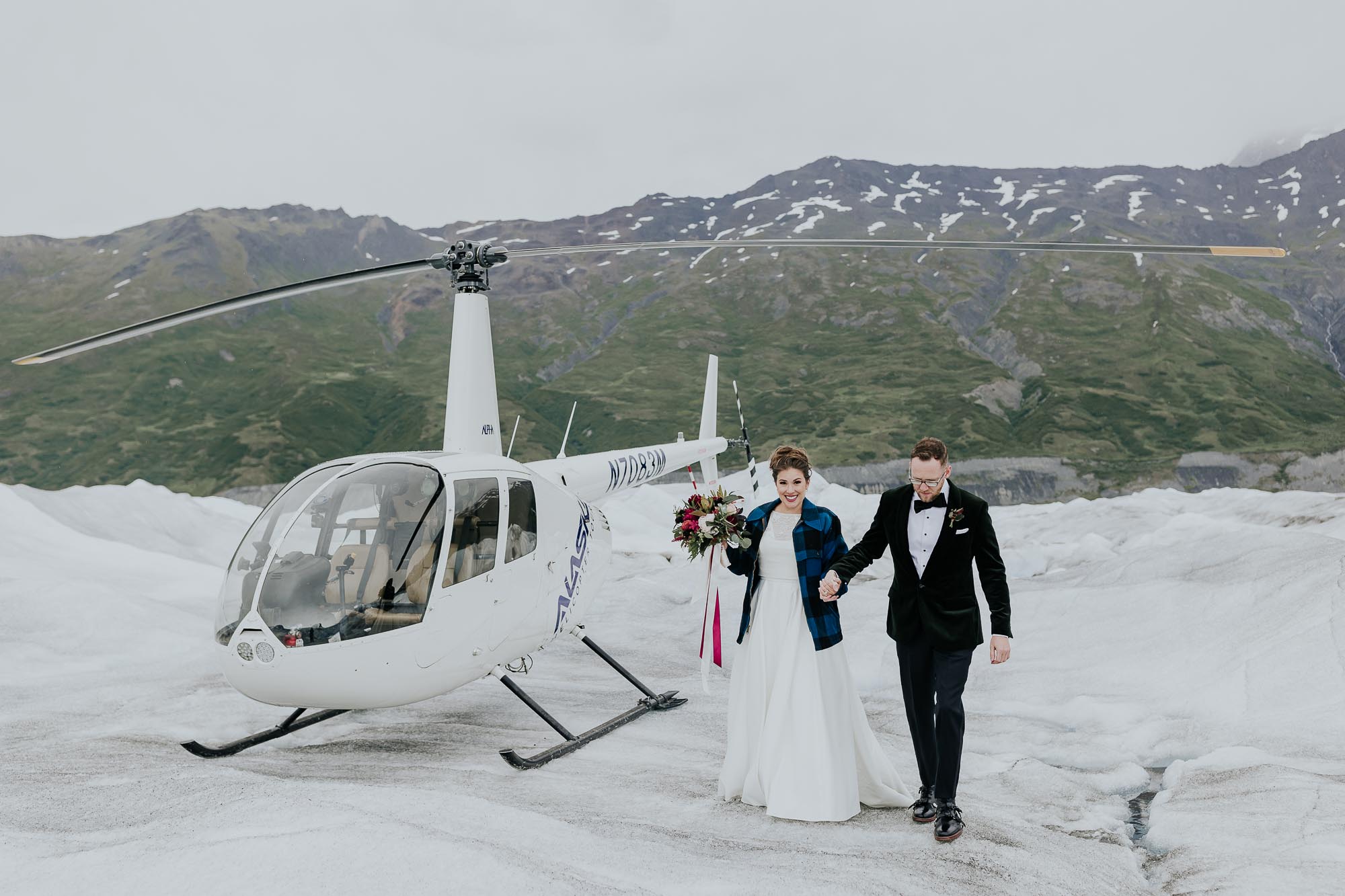 helicopter elopement in alaska wedding photographer