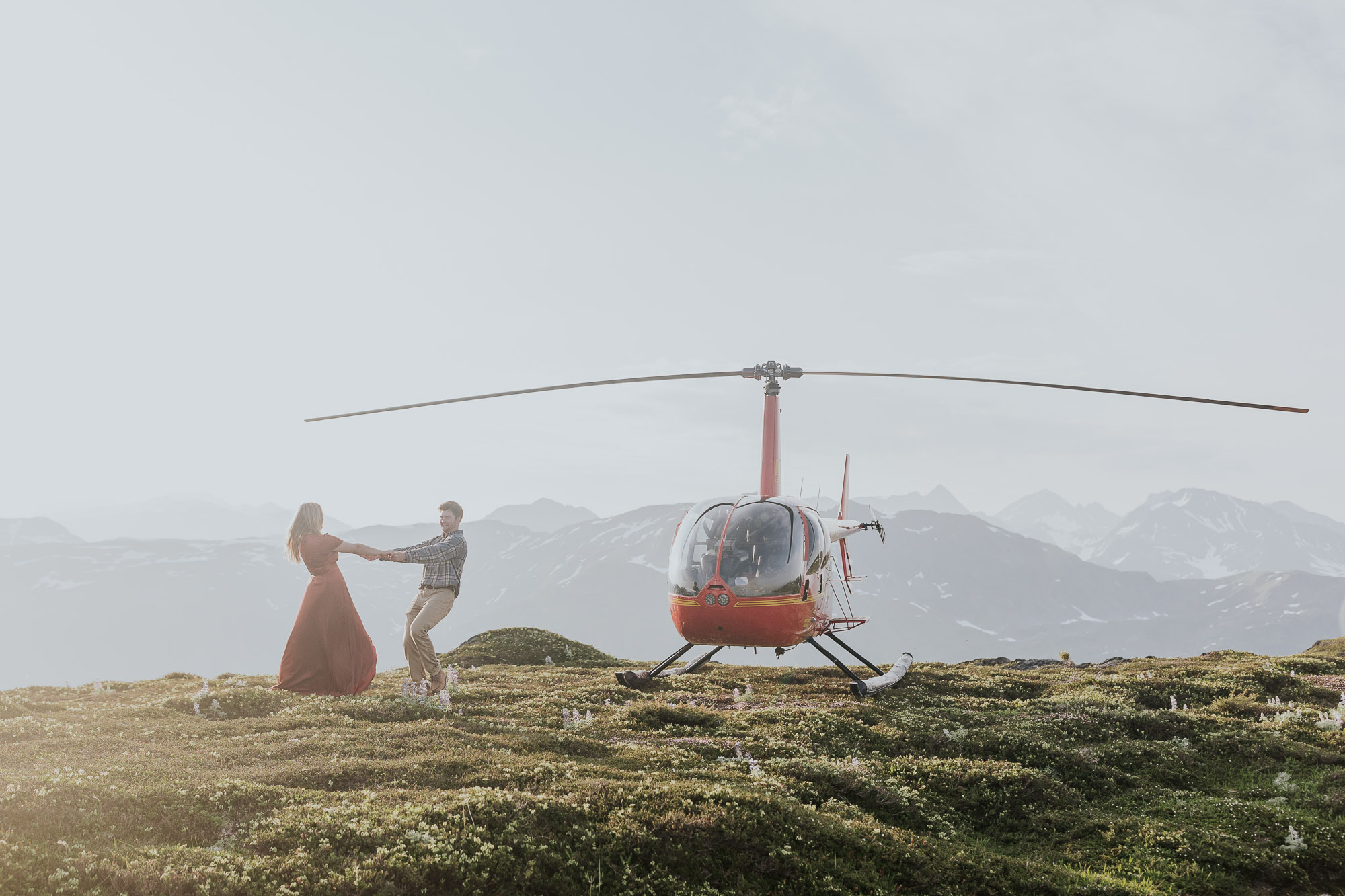 lively alaska helicopter engagement wedding photographer